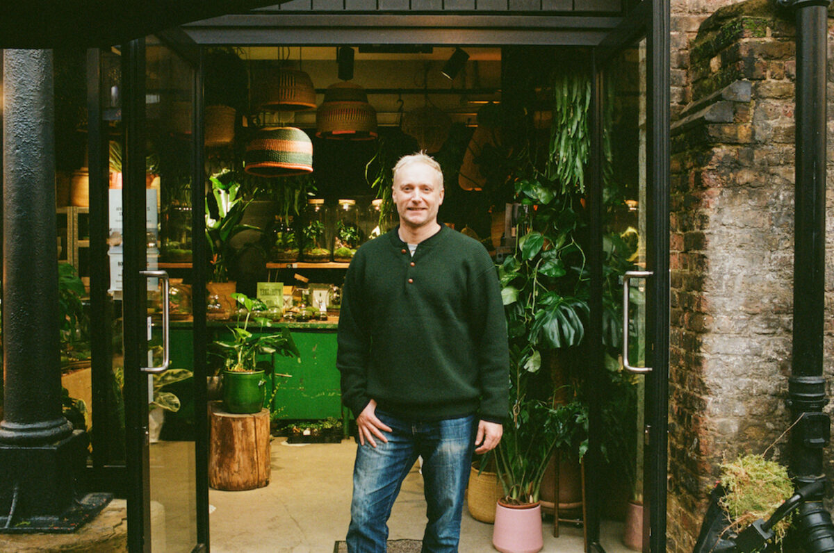 One of the founders of Botanical Boys standing outside the store